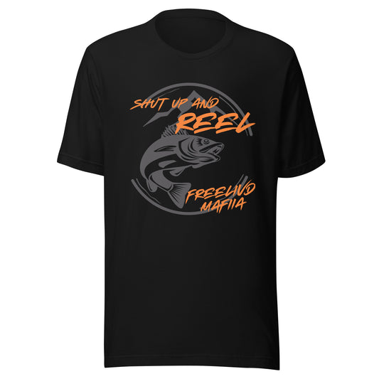 Say less. Fish more.

The “Shut Up and Reel” T-Shirt by FreelivdMafiia is made for the anglers and outlaws who know talk doesn’t catch fish — action does. With a bold fish graphic and unapologetic quote across the chest, this black tee is perfect for long days on the water or off-grid weekends with the crew.

Made from soft, durable fabric with a relaxed unisex fit, it’s the kind of shirt that works just as well on the boat as it does behind the wheel of a truck.