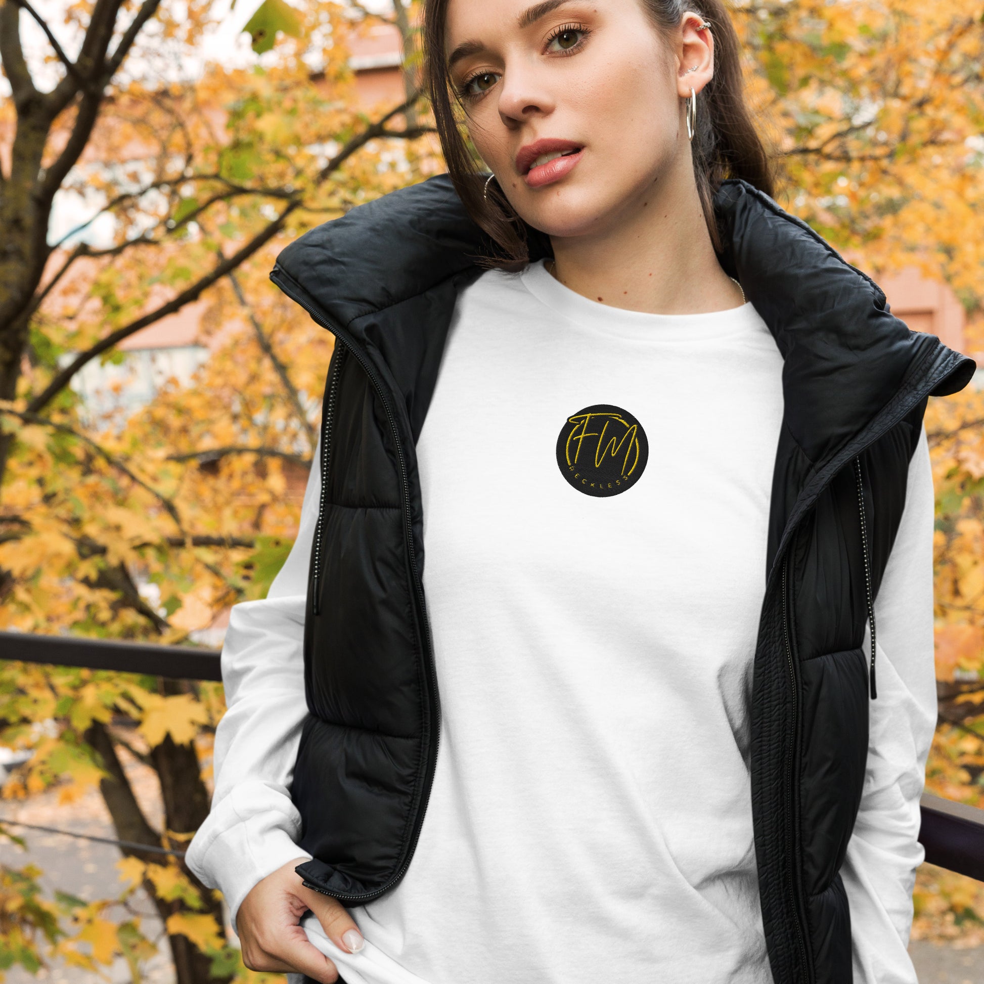 Crisp, clean, and made for chaos. This long sleeve white tee is your go-to layer — whether you're fishing, rolling, or just staying reckless.

FreelivdMafiia is a wardrobe essential for anyone living wild, outdoors, or off-script. With a classic fit and soft feel, it works solo in warmer months or layered under flannels and jackets when the cold hits. Women fall outfit